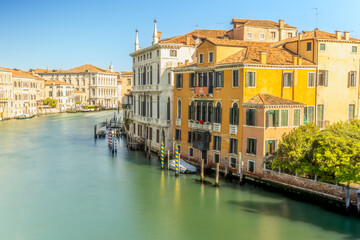 Busy Grand Canal with boats and historic palaces in Venice, Italy
