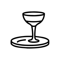 Crystal wine glass on dessert plate in minimalist style  