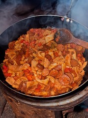 Traditional rustic Brazilian food known as dobradinha  prepared with beef tripe, white beans and classic seasonings in a rustic setting