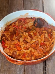 Traditional rustic Brazilian food known as dobradinha  prepared with beef tripe, white beans and classic seasonings in a rustic setting