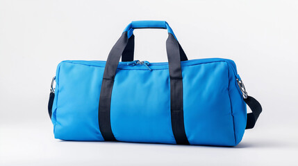 Fototapeta premium A durable blue gym bag with multiple compartments and a shoulder strap, isolated on a white background. 