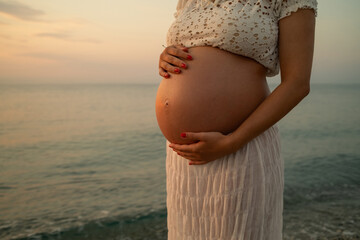 The Blue Of The Sea Surrounding A Pregnant Woman 