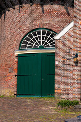 Historic windmill 't Slot ('t Slot, 1832) is a round stone scaffold mill. Gouda, South Holland province, The Netherlands.