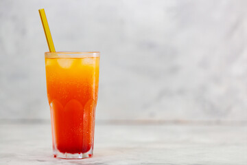 Dirty Soda in Tall Glass with Ice on Gray Background, Trendy Dirty Soda Concept, Copy Space