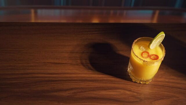 Spicy mango margarita in 3 different glasses