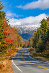 landscape view of autumn road in forest to mountain Washington