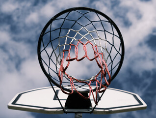 A basketball net with a red