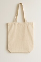 Beige Canvas Tote Bag Hanging on Wall