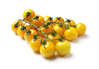 Branches with yellow cherry tomatoes isolated on white