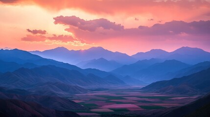 Obraz premium Sunset Hues Overlayered Mountain Ranges Valley Landscape