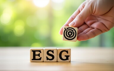ESG concept of environmental, social and governance. Sustainable corporation development. Hand flips wooden cubes with target setting  to ESG icon with other ESG icons on bright background.Copy space.