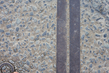 Rustic Stone Path Divided by Weathered Steel Plates Texture Background Image