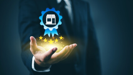 Businessman five star rating and store icon blue ribbon. Concept of brand trust, quality assurance, and excellence and customer satisfaction ecommerce top rated service digital business environment.