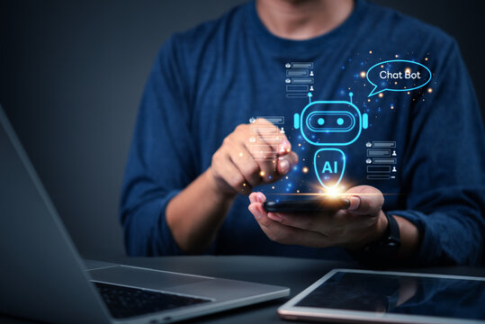 Man hand holding mobile phone showing AI chatbot interface. Concept of artificial intelligence, customer support automation, and virtual assistant technology for smart communication. - Powered by Adobe