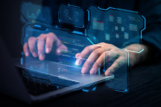 Close-up of hands coding programmer works on a laptop with futuristic cybersecurity interface, Concept of software development, data science, and artificial intelligence and digital transformation.