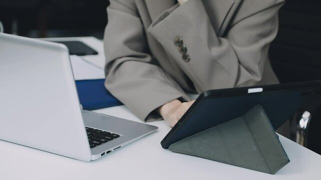 Two asian team working development of programming and encryption technology website design programmers on desk in office