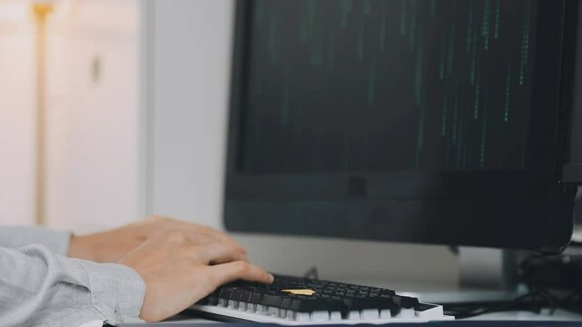 Two asian team working development of programming and encryption technology website design programmers on desk in office