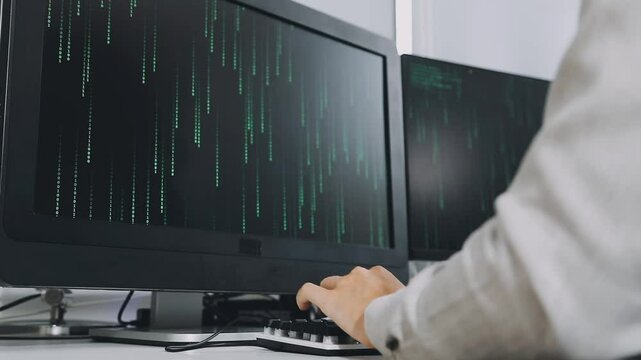 Two asian team working development of programming and encryption technology website design programmers on desk in office