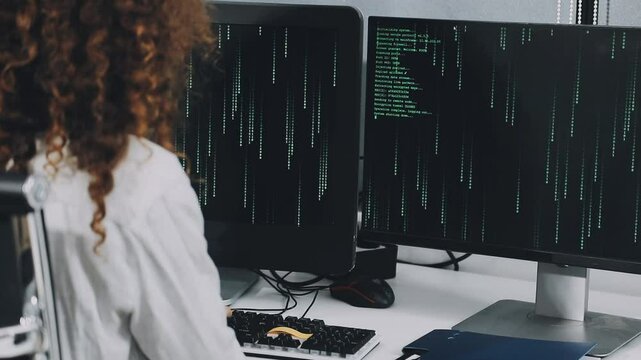 Two asian team working development of programming and encryption technology website design programmers on desk in office
