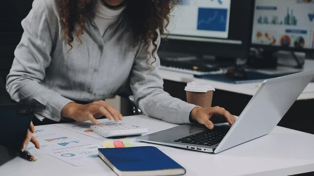 Two asian team working development of programming and encryption technology website design programmers on desk in office