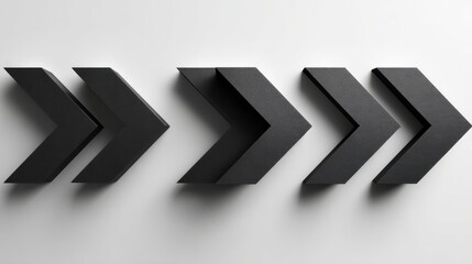 Abstract black directional symbols with sharp shadows on white, geometric precision in modern design
