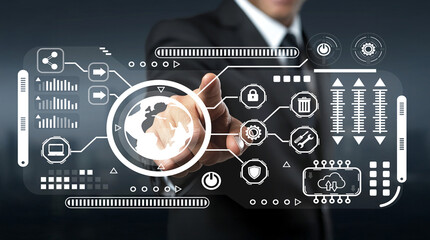 Businessman interacting with futuristic digital dashboard displaying global data visualization and cybersecurity elements for modern technology use