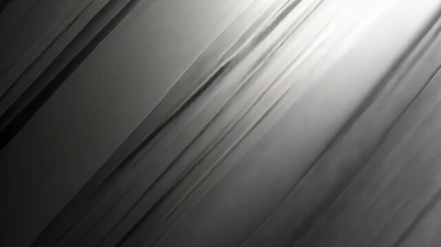 Angled, textured black panels create diagonal lines with gradient and highlights