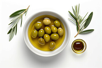 Overhead view of olives nuts and oil in a white bowl
