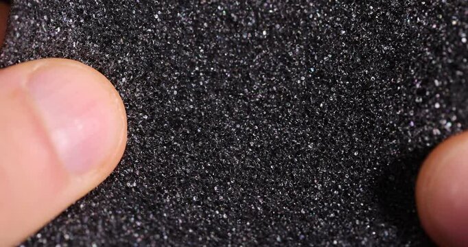 black foam for safe packaging of objects and products, foamy soft foam for giving elasticity to objects or sound insulation or as a packaging material