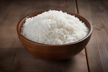 White rice displayed in a wooden bowl on a table