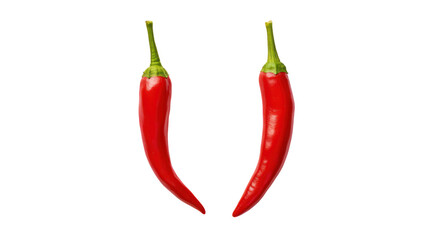  Two bright red chili peppers with green stems on transparent background