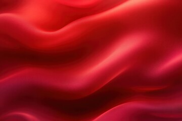 Obraz premium Smooth red silk fabric with soft flowing folds creating elegant and rich texture