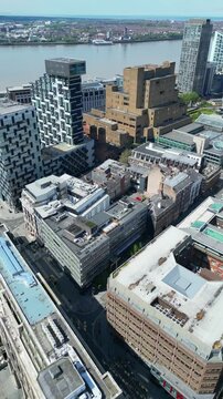 Aerial View of Historical and Modern Central Town Center and Downtown Buildings at British City Centre of Liverpool, Maritime city in northwest England, United Kingdom on Beach and Ocean Docks.