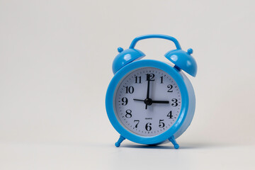 Blue Alarm Clock Isolated on White Background