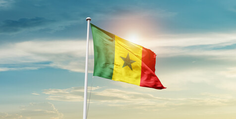 Senegal flag waving in beautiful sky with mast. A proud moment flag waving with sunlight.