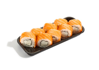 Salmon sushi rolls in minimalist bright lighting, high-contrast appetizing composition