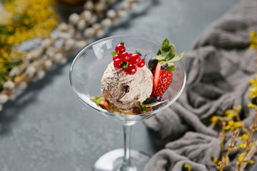 Vegan berry ice cream in elegant glass, natural daylight, vibrant color contrast, minimalistic composition