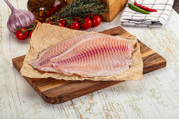 Raw Tilapia fish fillet slice