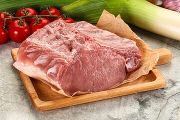 Raw pork loin cut with bone