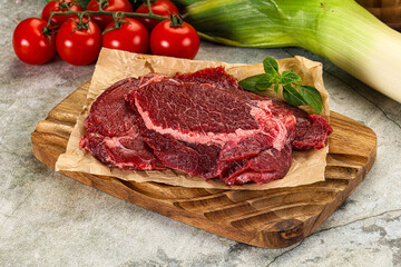 Raw beef cheeks cut for cooking