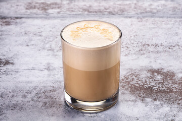 Hot latte beverage in the glass