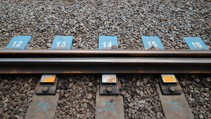 number markers on railroad tracks