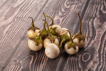 Raw white small baby eggplant