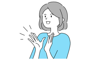 拍手で称賛を伝える笑顔の若い女性
