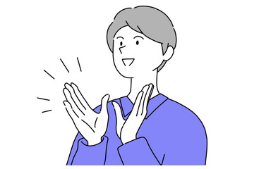 拍手で称賛を伝える笑顔の若い男性