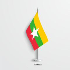 Myanmar table flag on light grey background. Myanmar desk flag isolated on grey background	