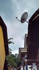 Satellite Dish on Building Rooftop