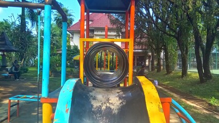 playground slide designed for children's outdoor recreation, suitable for parks and schoolyards.