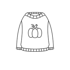 A pumpkin is on a sweater