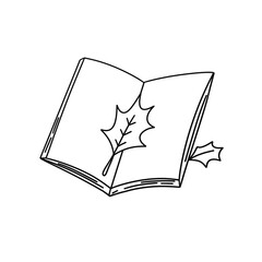 A book with a leaf on it
